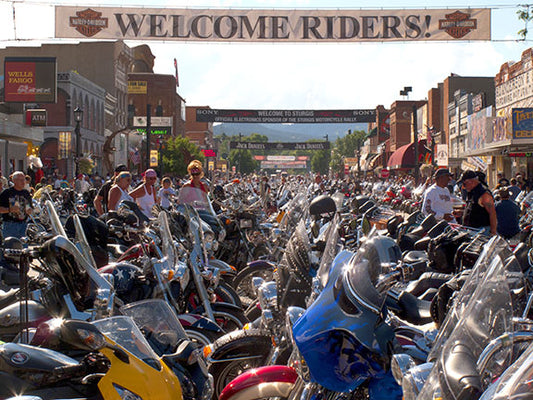 Crowds check out the custom cruisers that line the streets of Sturgis, South Dakota during the Sturgis Motorcycle Rally.