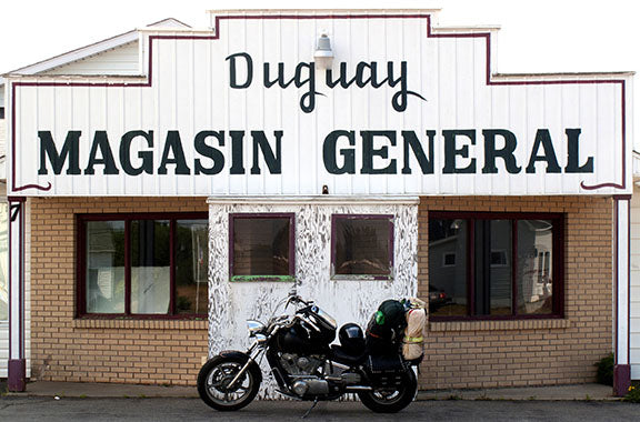 A 1995 Honda Shadow VT1100 rests outside Duguay Magasin General store in Quebec, Canada photo