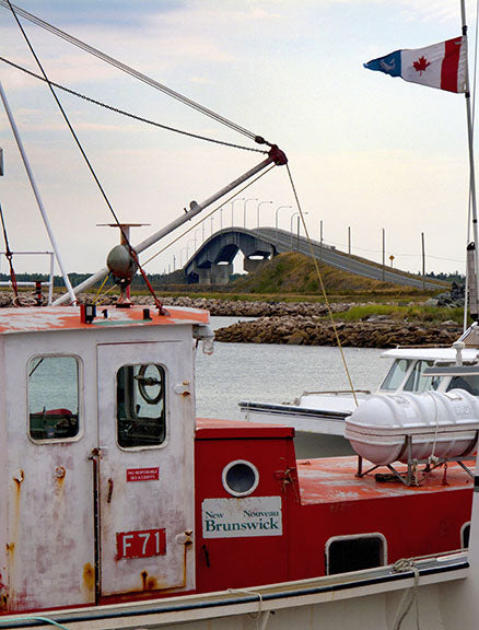 This bridge in New Brunswick, Canada, accommodates boats with its high arch