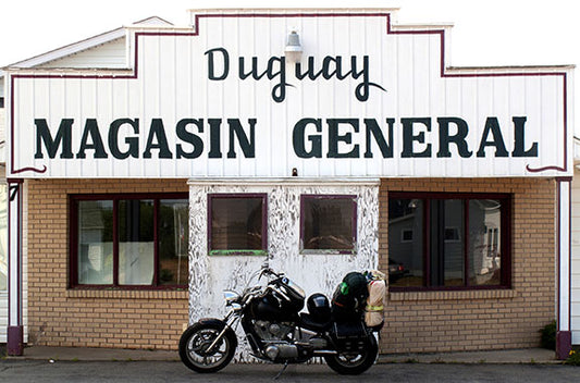A 1995 Honda Shadow VT1100 rests outside Duguay Magasin General store in Quebec, Canada photo