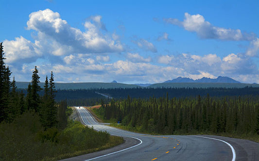 Lone trucker on the open highway in Alaska photo