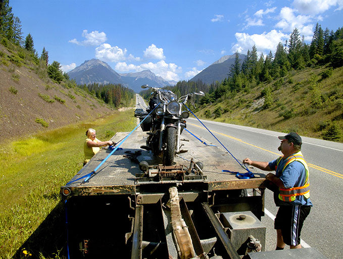 We all encounter unexpected difficulties in our lives. Here, photographer Geoffrey Kula’s 1995 Honda Shadow VT1100 sits atop a tow truck after breaking down in British Columbia just outside Lake Louise, Alberta.