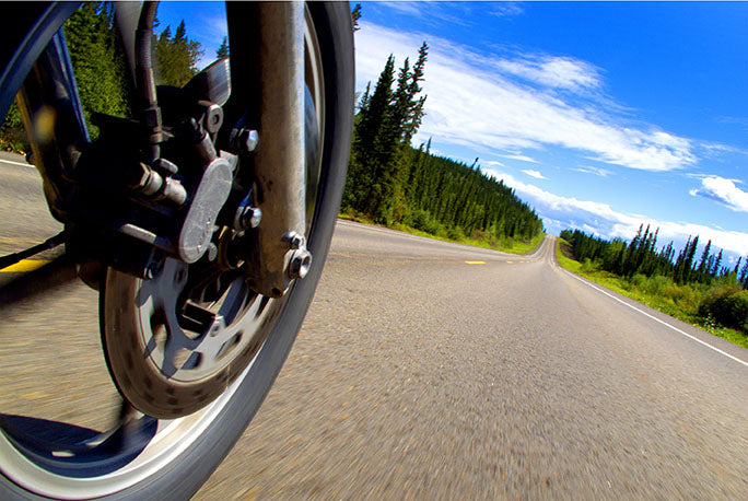 Photographer Geoffrey Kula cruises along the ALCAN (Alaska-Canadian) Highway on his 1995 Honda Shadow VT1100 during his cross-country motorcycle adventure from Alaska to Boston